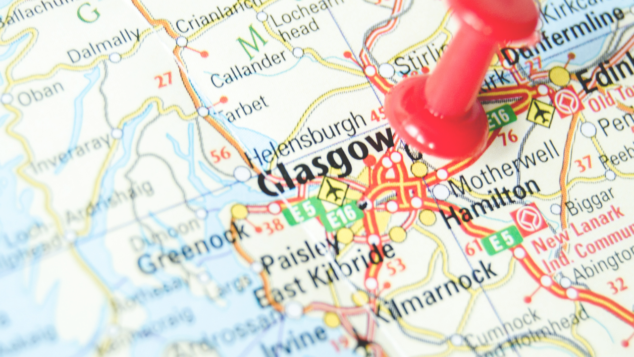 Glasgow on a map with a red pin in it.