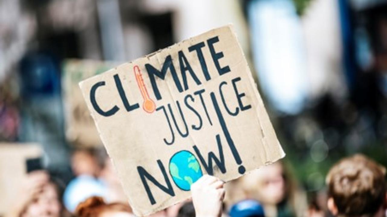 Climate Justice Now - from Unsplash https://unsplash.com/photos/dYZumbs8f_E (CC BY 4.0)