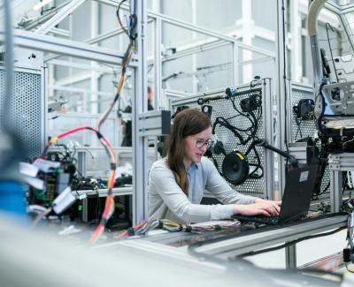 Young woman working on a science lab. Photo by ThisisEngineering on Unsplash