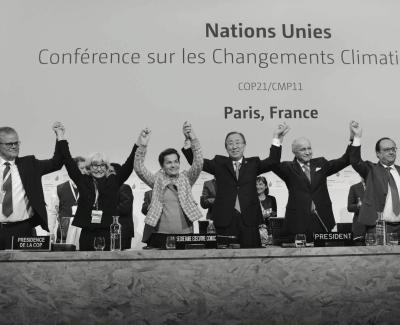Delegates celebrate the Paris Agreement
