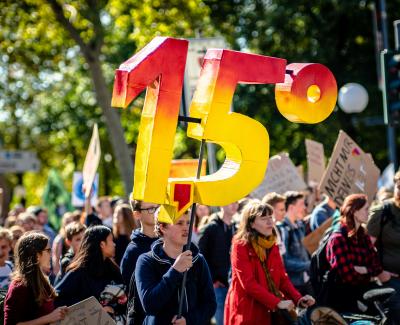 Young people marching for the planet. Photo by Mika Baumeister on Unsplash